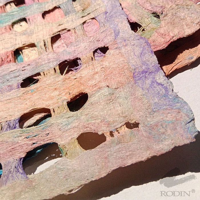 Papel amate hecho a mano perforado arcoíris 40X60